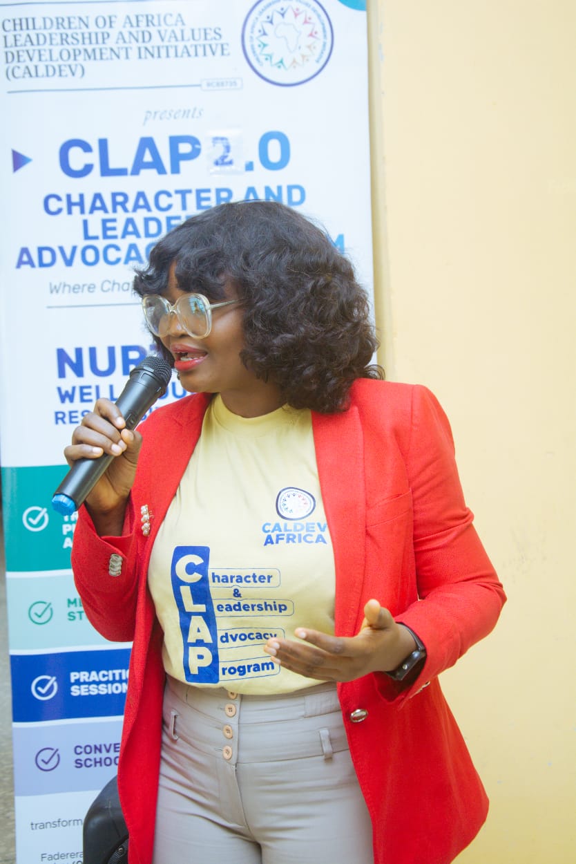 Aminat Ojodu, Founder of NGO Bestie, speaking at a community event
